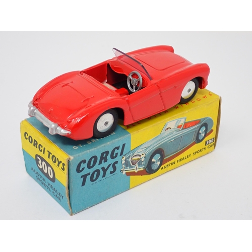 1260 - A boxed Corgi Toys No.300 red Austin Healey Sports