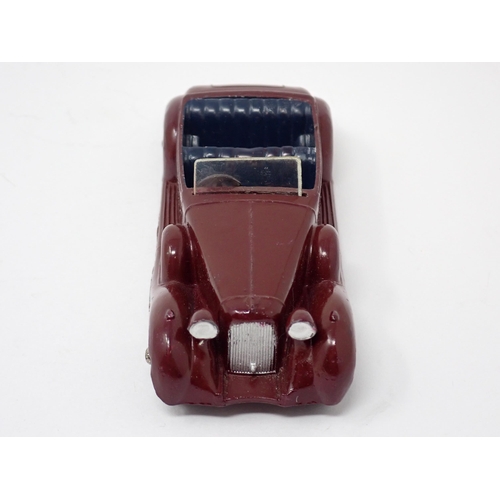 1266 - A rare Dinky Toys No.38C maroon Lagonda