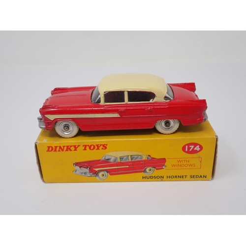 1276 - A boxed Dinky Toys No.174 red and cream Hudson Hornet