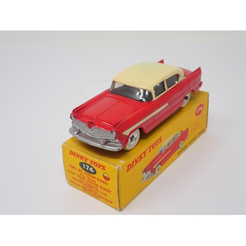 1276 - A boxed Dinky Toys No.174 red and cream Hudson Hornet