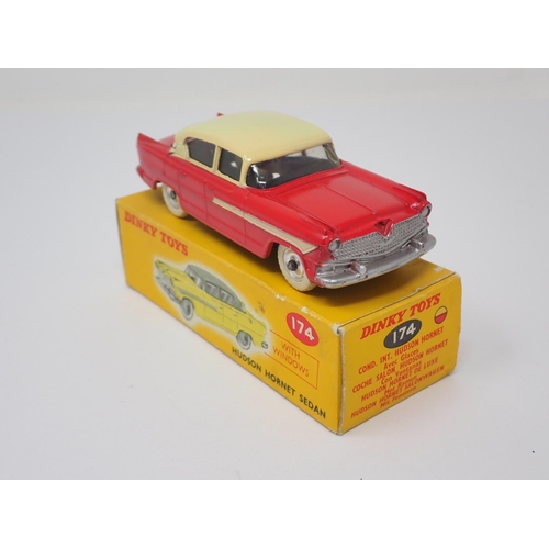 1276 - A boxed Dinky Toys No.174 red and cream Hudson Hornet