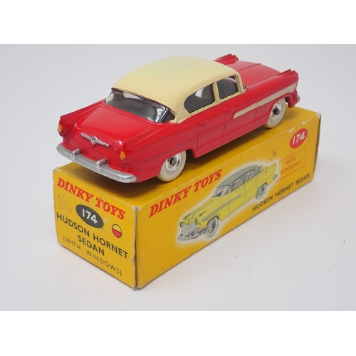 1276 - A boxed Dinky Toys No.174 red and cream Hudson Hornet