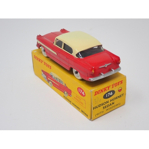 1276 - A boxed Dinky Toys No.174 red and cream Hudson Hornet