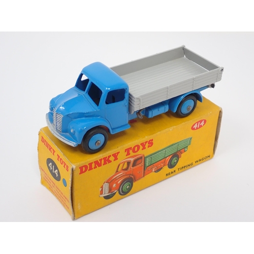 1280 - A boxed Dinky Toys No.414 blue and grey Rear Tipping Wagon