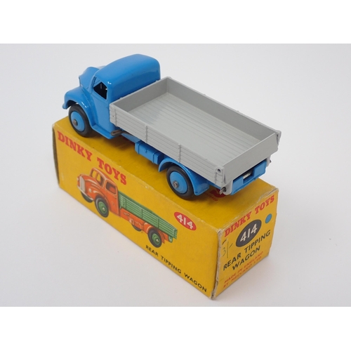 1280 - A boxed Dinky Toys No.414 blue and grey Rear Tipping Wagon