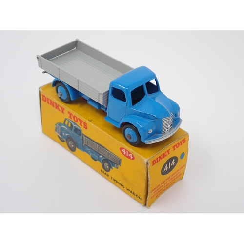 1280 - A boxed Dinky Toys No.414 blue and grey Rear Tipping Wagon