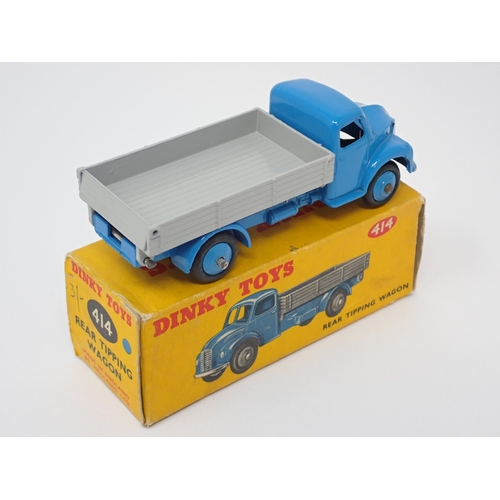 1280 - A boxed Dinky Toys No.414 blue and grey Rear Tipping Wagon