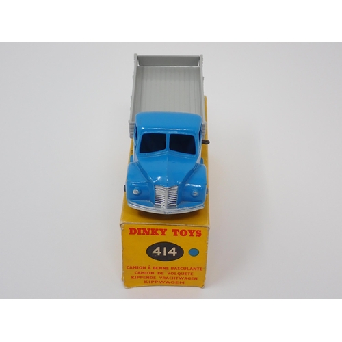 1280 - A boxed Dinky Toys No.414 blue and grey Rear Tipping Wagon