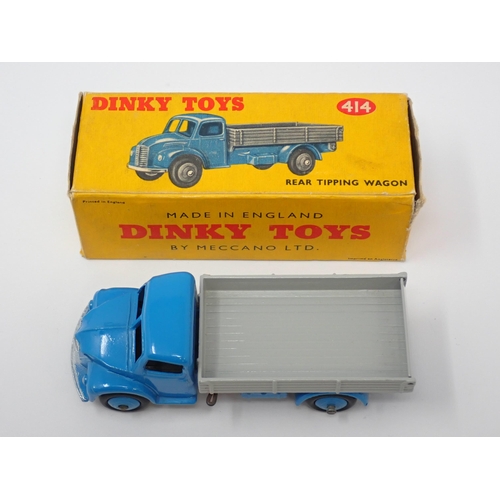 1280 - A boxed Dinky Toys No.414 blue and grey Rear Tipping Wagon