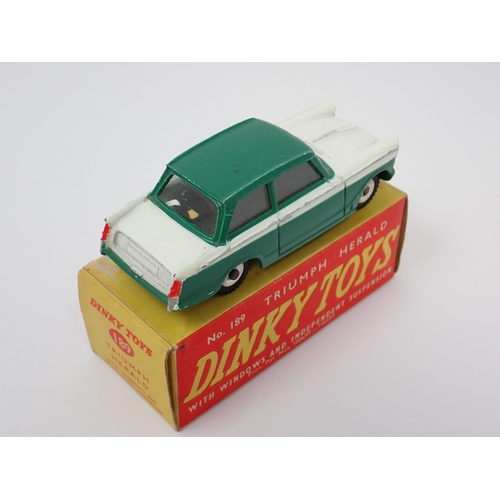 1281 - A boxed Dinky Toys No.189 green Triumph Herald