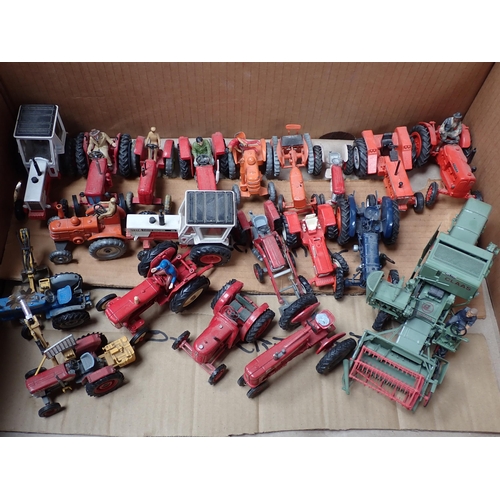 1295 - A box of unboxed Britains, Dinky, Corgi Toys and other Tractors and Combine Harvesters