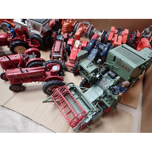 1295 - A box of unboxed Britains, Dinky, Corgi Toys and other Tractors and Combine Harvesters