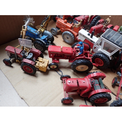 1295 - A box of unboxed Britains, Dinky, Corgi Toys and other Tractors and Combine Harvesters