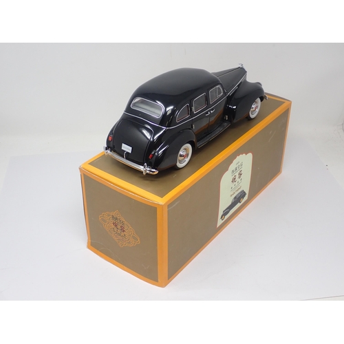 1301 - A boxed Weimanhuanghou 1:18 scale Car