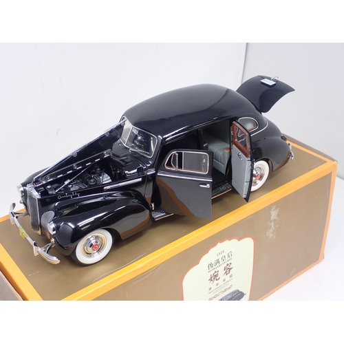 1301 - A boxed Weimanhuanghou 1:18 scale Car