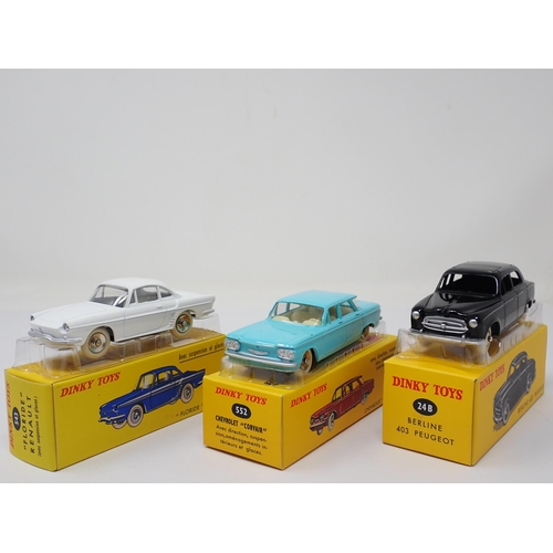 1312 - A boxed Atlas Dinky Toys No.24B French Berline 403 Peugeot, No.543 'Floride' Renault and No.552 Chev... 