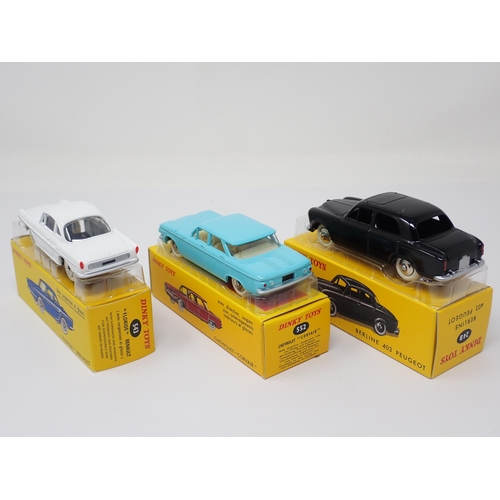 1312 - A boxed Atlas Dinky Toys No.24B French Berline 403 Peugeot, No.543 'Floride' Renault and No.552 Chev... 