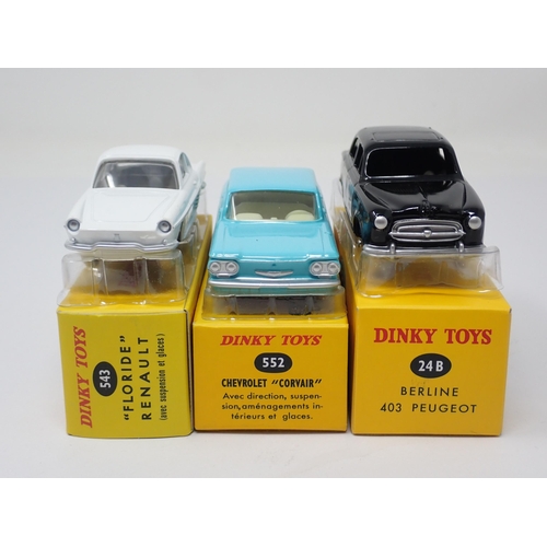 1312 - A boxed Atlas Dinky Toys No.24B French Berline 403 Peugeot, No.543 'Floride' Renault and No.552 Chev... 