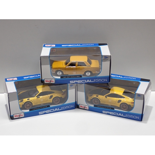 1374 - Three boxed Maisto Special Edition 1:24 scale Models including Porsche 911 GT2s and Datsun 510 and a... 