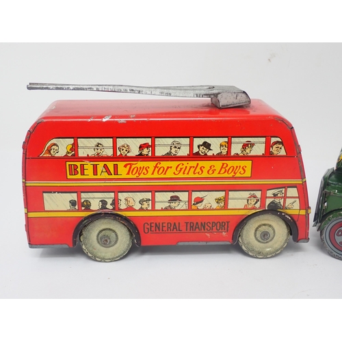 1384 - Two Brimtoy tinplate double decker Buses and two clockwork Buses