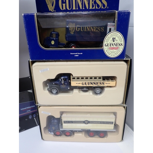 1399 - Five boxed Corgi Guinness Lorries, a boxed Corgi Damac Transporters Lorry and a boxed M.A.N. Rohrbac... 