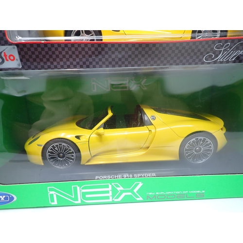 1406 - A boxed Maisto 1:18 scale Special Edition Alfa Romeo Spider, a boxed Maisto Premiere Edition Mercede... 