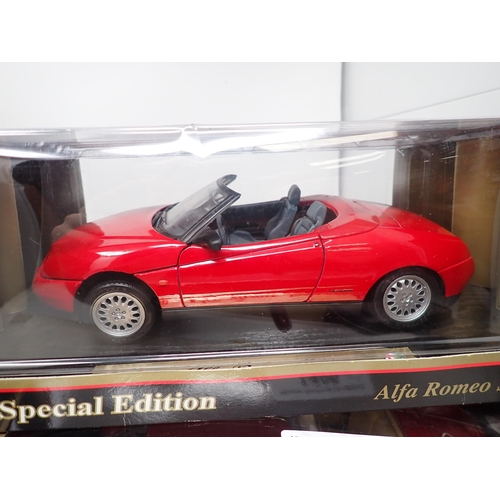 1406 - A boxed Maisto 1:18 scale Special Edition Alfa Romeo Spider, a boxed Maisto Premiere Edition Mercede... 