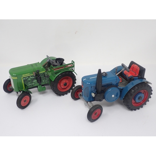 1425 - A boxed Lanz Bulldog 4016 Tractor, an unboxed Lanz Bulldog Tractor and an unboxed Fendt Dieselross T... 