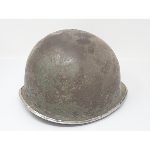 1471 - A WWII American Combat Helmet with liner (front seam), a Brown Bess Bayonet and an 1853 Enfield Bayo... 