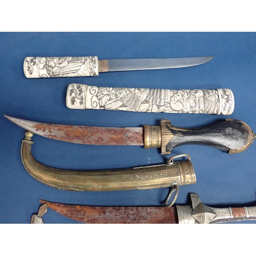 1535 - WITHDRAWN-Five Eastern Daggers, a Japanese Tanto in bone scabbard and two Sheath Knives