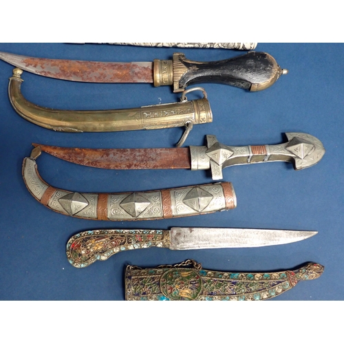 1535 - WITHDRAWN-Five Eastern Daggers, a Japanese Tanto in bone scabbard and two Sheath Knives