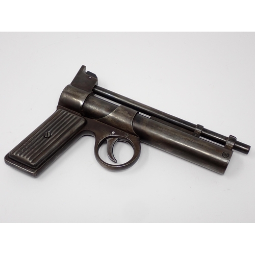 1550 - A Webley Junior .177 Air Pistol with tin grip