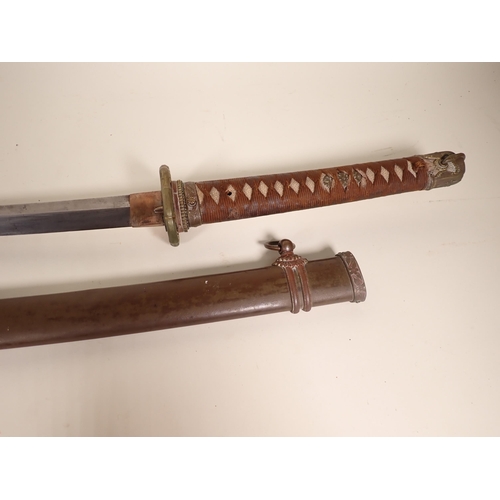 1467 - A Japanese Katana by Ishido Teruhide in WWII military mounts. This smith was descended from the famo... 