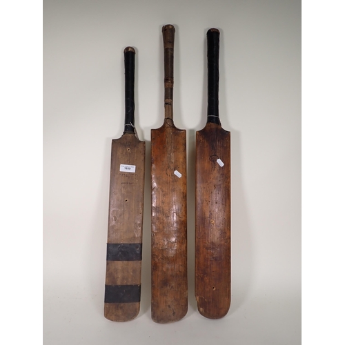 1659 - A Driver, Pakistan Size 6 Cricket Bat, a Crawford Cricket Bat and a George Brown type Cricket Bat