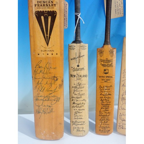 1663 - Five miniature Cricket Bats including Gray-Nicholls signed by Sussex 1986 team and printed New Zeala... 