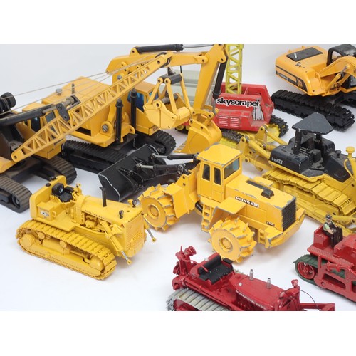 1294 - A box of unboxed diecast Plant Machinery Models including Cranes, Diggers and Bulldozers