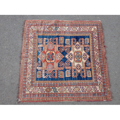 1 - A bordered Persian Rug with multi-bordered design, with stylised motifs on a blue ground, 5ft 2in x ... 