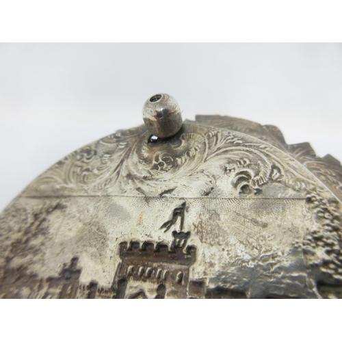 110 - A Victorian silver Chamber Candlestick embossed with castle (possibly Windsor) with leafage scroll s... 