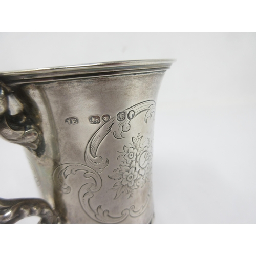 111 - A Victorian silver Christening Mug of waisted form with floral engraved reserves and initials, Londo... 