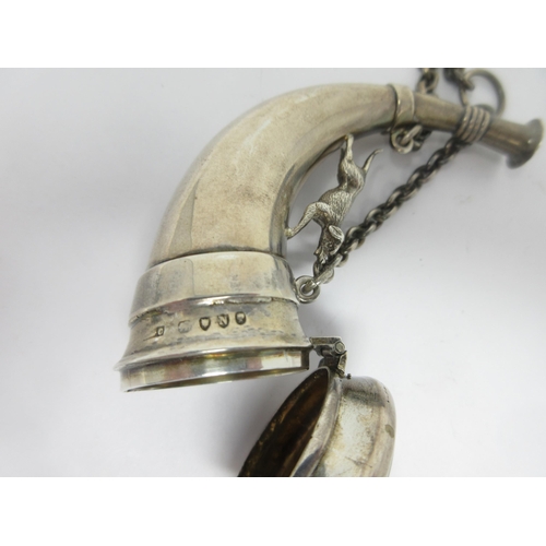 114 - A Victorian silver Snuff Box in the form of a hunting horn with dog surmount, London 1888