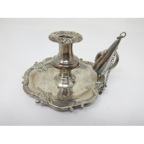 134 - A Victorian silver small Chamber Candlestick with scroll border and Snuffer, Birmingham 1838