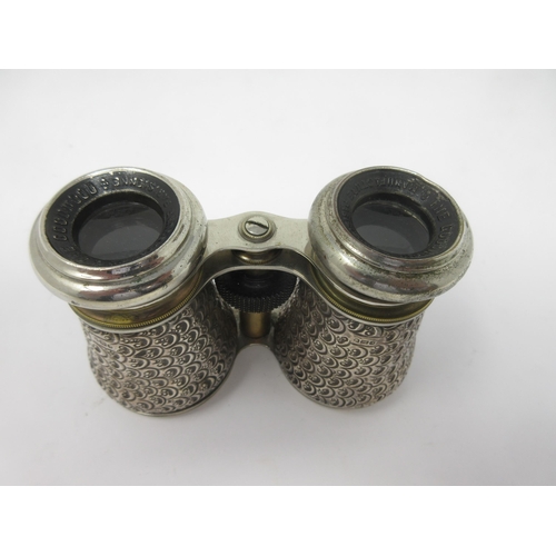 141 - A pair of George V silver mounted Binoculars, 'The Goodwood', London 1910