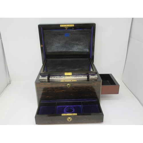 149 - A fine quality Victorian coromandel Travelling Dressing Case, fitted silver mounted accessories with... 