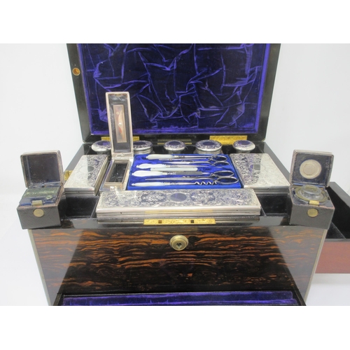 149 - A fine quality Victorian coromandel Travelling Dressing Case, fitted silver mounted accessories with... 