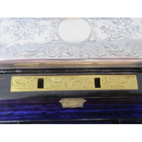 149 - A fine quality Victorian coromandel Travelling Dressing Case, fitted silver mounted accessories with... 