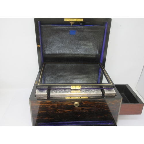 149 - A fine quality Victorian coromandel Travelling Dressing Case, fitted silver mounted accessories with... 