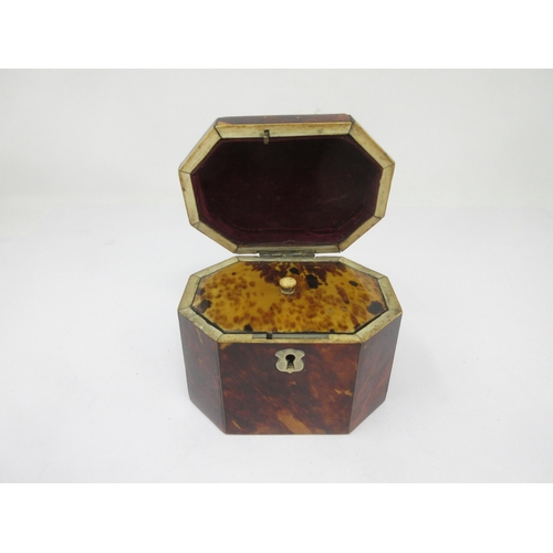 15 - A 19th Century small tortoiseshell octagonal Tea Caddy with interior cover, 4½in