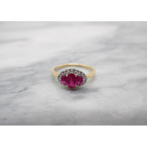 164 - A Ruby and Diamond Cluster Ring claw-set oval-cut ruby, calculated 0.56cts, between two lunette-cut ... 