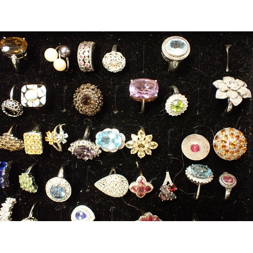 188 - A large collection of approx sixty Dress Rings set various stones, mostly in silver