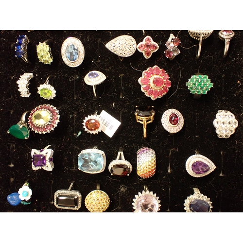 188 - A large collection of approx sixty Dress Rings set various stones, mostly in silver